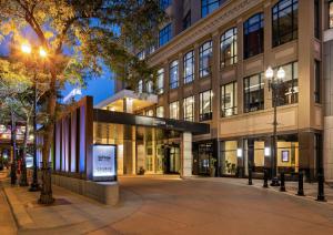 an empty street in front of a building at The Lofton Hotel Minneapolis, Tapestry Collection by Hilton in Minneapolis