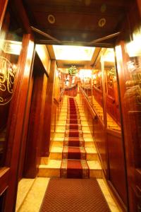 a view of a stairway in a cruise ship at Hotel Lux in Venice