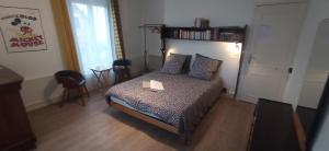 Postel nebo postele na pokoji v ubytování Chez Alex' guesthouse + 25 fotografií
