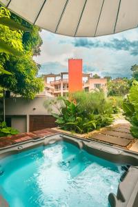 Bazén v ubytování Del Tropico hotel nebo v jeho okolí