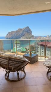 a large balcony with a view of the ocean at Esmeralda Suites Sunrise in Calpe