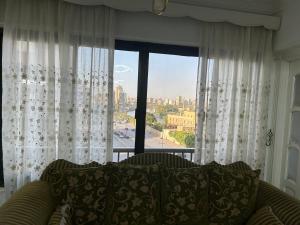 Χώρος καθιστικού στο Nile view apartment