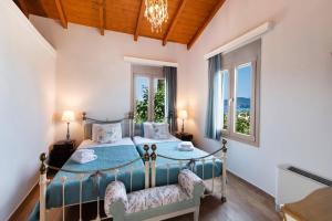 Postel nebo postele na pokoji v ubytování Villa Zogianna by Villa Plus + 15 fotografií