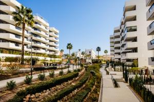 a street in front of a apartment building at Sea Arenales del Sol in Arenales del Sol
