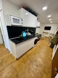 Kuchyň nebo kuchyňský kout v ubytování Manuela Home