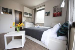 Postel nebo postele na pokoji v ubytování Frauenpreiss - Wohnung 54