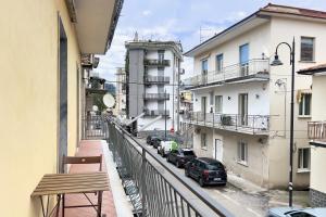 a balcony with a view of a street with parked cars at Da Susanne, Central Agropoli apartment in Agropoli