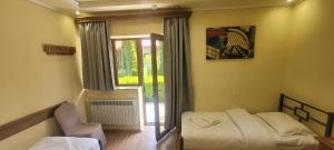 Voodi või voodid majutusasutuse DALLAR Guest House toas