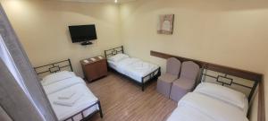 Voodi või voodid majutusasutuse DALLAR Guest House toas