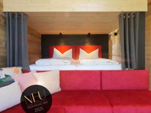 Katil atau katil-katil dalam bilik di WerderChalet -- SEABREEZE -- Meerblick I Strand 150m I Sauna I eKamin I 2 Personen und Kind I by "Meyers am Meer"