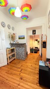 a living room with a fireplace at Asian Everest House in Lisbon +49 photos