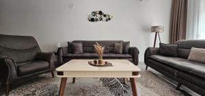 Posezení v ubytování Value Living Apartment