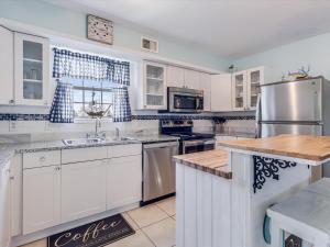 Kuchyň nebo kuchyňský kout v ubytování Fishermans Inn