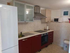 Kuchyň nebo kuchyňský kout v ubytování Apartments with parking spaces Marina, Trogir - 11554