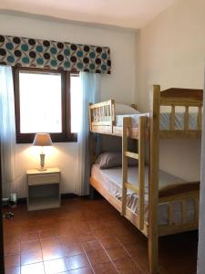 Postel nebo postele na pokoji v ubytování Frida Hostel
