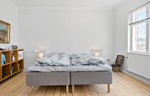 Voodi või voodid majutusasutuse Cozy Apartment In Nordborg toas