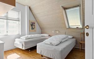 Voodi või voodid majutusasutuse Cozy Apartment In Nordborg toas