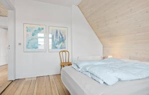 Voodi või voodid majutusasutuse Cozy Apartment In Nordborg toas