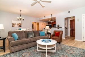 a living room with a couch and a table at 4108-1P Relax in this 1 BR Peaceful Haven in Saint Augustine