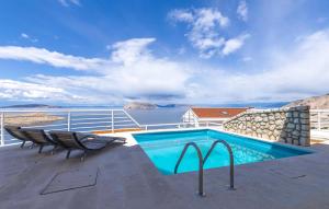 a swimming pool on the deck of a cruise ship at 2 Bedroom Amazing Apartment In Lukovo in Lukovo