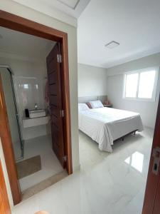 En eller flere senge i et værelse på APARTAMENTO COP30 - Apartment COP30