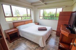 Postel nebo postele na pokoji v ubytování hotel el portal de las Flores, Alojamiento Rural