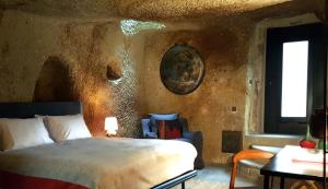 Postel nebo postele na pokoji v ubytování SOTA Cappadocia