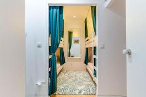 Postel nebo postele na pokoji v ubytování Cozy Nest