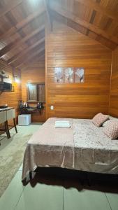 Postel nebo postele na pokoji v ubytování Chalé do Vale