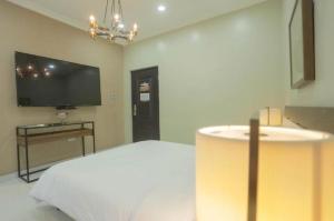 TV a/nebo společenská místnost v ubytování Kobbies Studio + 17 fotografií