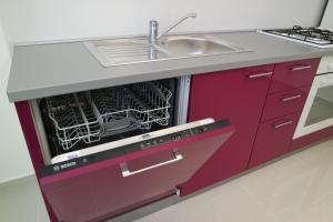 Kuchyň nebo kuchyňský kout v ubytování Apartments Jadranka