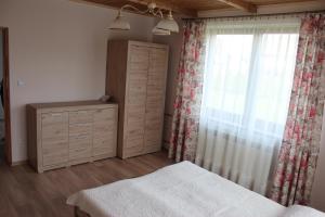 Posteľ alebo postele v izbe v ubytovaní Hawrań