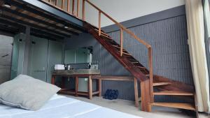 Ένα ή περισσότερα κρεβάτια σε δωμάτιο στο Rock Bay by Chành Rành