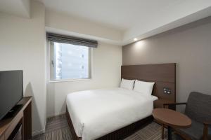 TV a/nebo společenská místnost v ubytování Hotel Oriental Express Kagoshima Tenmonkan