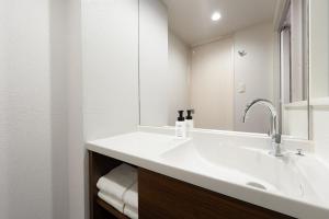 Koupelna v ubytování Hotel Oriental Express Kagoshima Tenmonkan