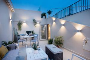Posedenie v ubytovaní Boutique Terrazza Aurea