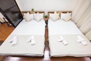 Llit o llits en una habitació de Master Residence Dotonbori Shinsaibashi
