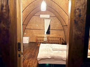 Postel nebo postele na pokoji v ubytování Nona Villa