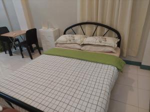Cama o camas de una habitación en GGGO RESIDENCES, Studio 103, King