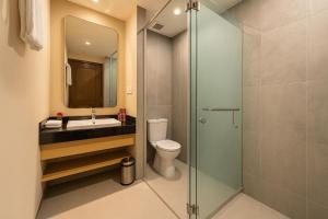 A bathroom at The Bellezza Hotel Suites