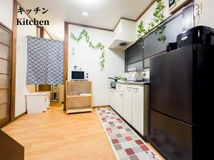 Kuchyň nebo kuchyňský kout v ubytování #池袋駅無料送迎サービス #上野14分丨日暮里10分丨一棟貸切丨最大7名# Ikebukuro Free Pickup#Ueno 14 mins 丨Nippori 10 mins 丨Entire property丨Up to 7 guests 丨B