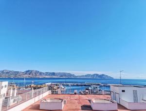 a view of a marina from the roof of a building at Beach Apartment in Puerto de Mazarrón