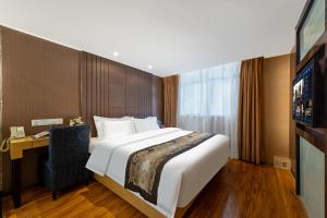 Postel nebo postele na pokoji v ubytování XW Hotel + 12 fotografií