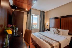 Postel nebo postele na pokoji v ubytování Park Avenue Hotel Nungambakkam + 37 fotografií