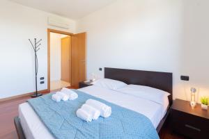 Postel nebo postele na pokoji v ubytování La terrazza di Giotto - 501