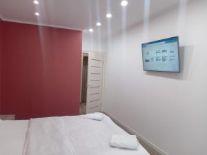 Postel nebo postele na pokoji v ubytování AVALON Apart-Hotel
