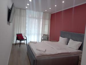 Postel nebo postele na pokoji v ubytování AVALON Apart-Hotel