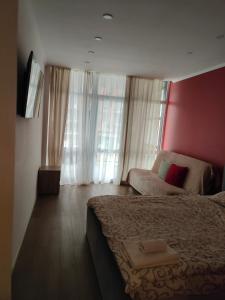 Postel nebo postele na pokoji v ubytování AVALON Apart-Hotel