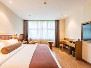 Postel nebo postele na pokoji v ubytování James Joyce Coffetel Shijiazhuang the Mixc Jinyuan Tower Airport Bus + 257 fotografií