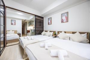 Llit o llits en una habitació de Master Residence Dotonbori Shinsaibashi